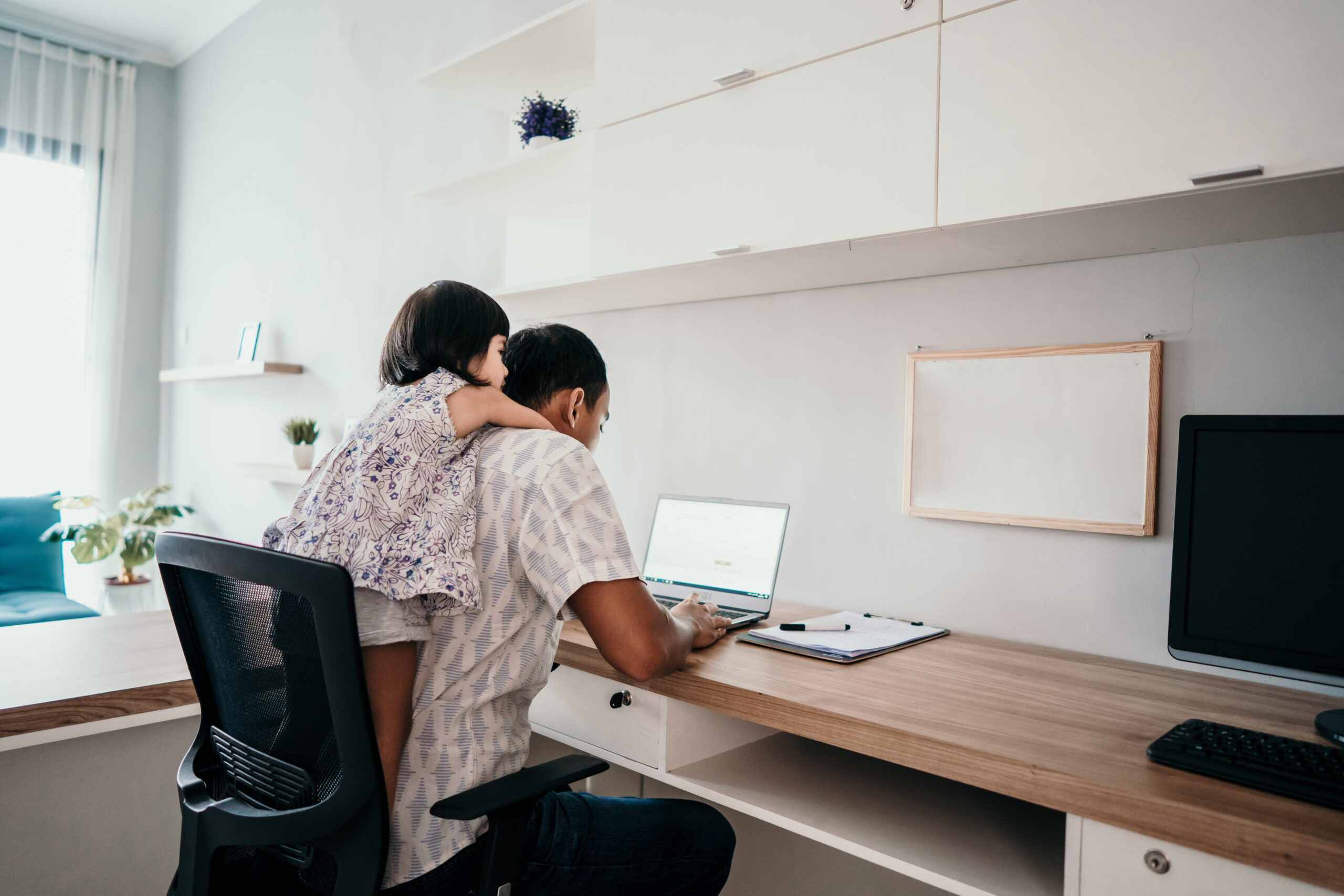 father working from home